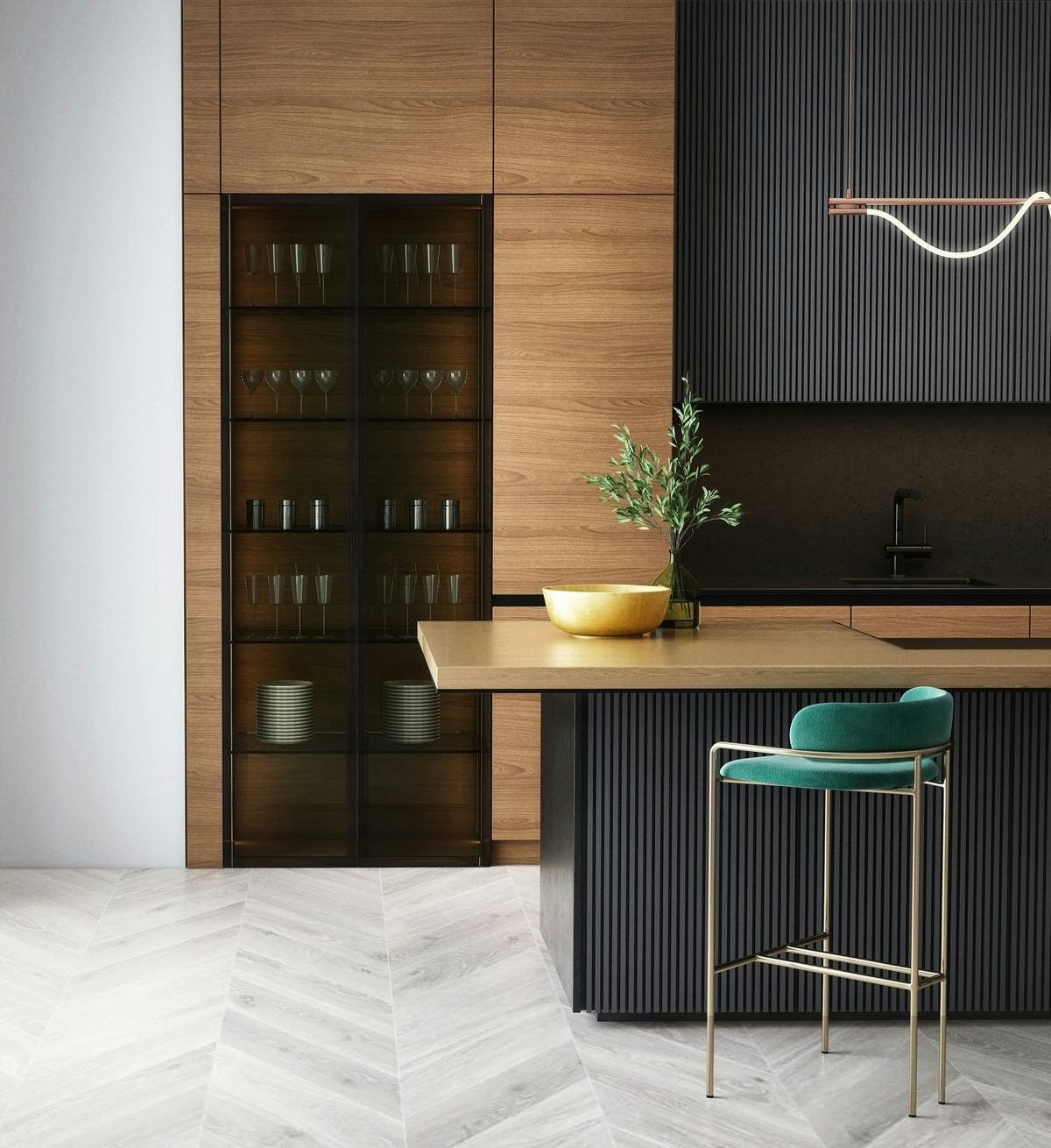 A modern kitchen with warm wood cabinetry, brass fixtures, and a green bar stool